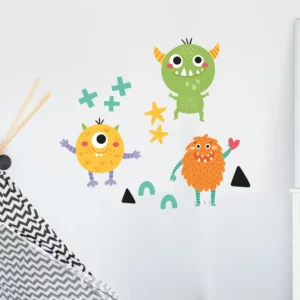 Väggdekor med tre snälla monster