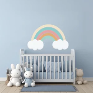 Väggdekor regnbåge på väggen i ett barnrum med moln